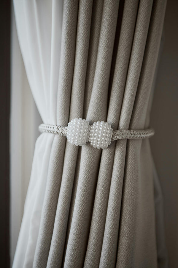 Deep-weave fabrics engineered to eliminate glare and create the perfect cinematic environment.